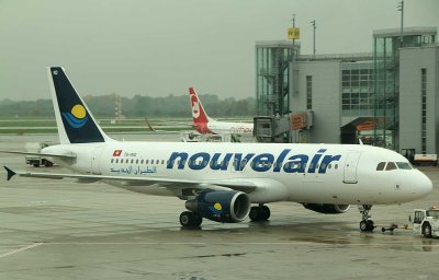 Nouvelair A-320 being pushed back to start its journey back to Tunisia