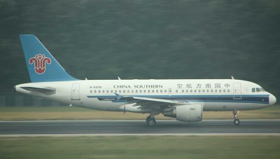 China Southern A-319 commencing take off run on PEK Runway 01