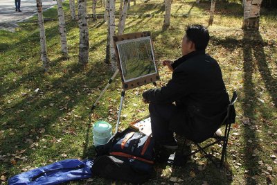 Artist in Samjiyong (三池渊街头画家）