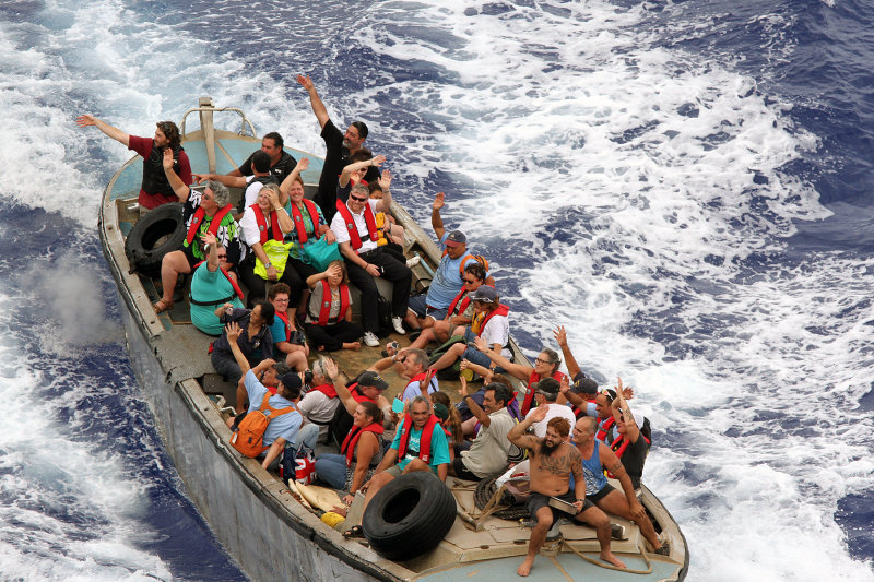 We waited patiently while the longboat was filled with boxes of food, beer, unsold merchandise & passengers.  Off they went!