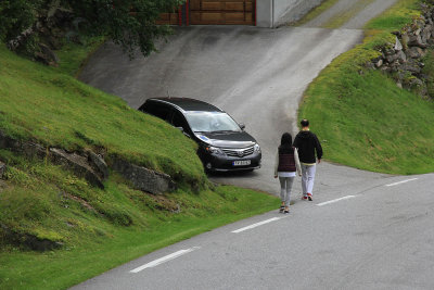 There was a car in our way on the narrow highway.  Bus driver got out & backed the dead rental car down for the hapless couple