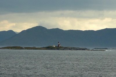 Lighthouse seen at dinner - Graysoyane near Aalesund while heading out to go down to Belfast