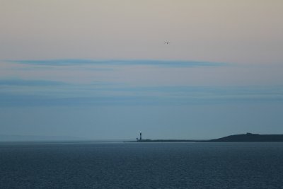 Sailaway from Belfast: Mew Island lighthouse near port 8pm; saw am too