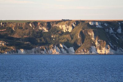Weymouth cliffs near sunset time from ship when departing