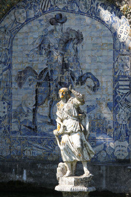Statue in water and more blue tile