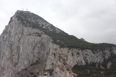 GIBRALTAR: The Rock, looming large. Cool & cloudy for once, & British spoken here. Yay!