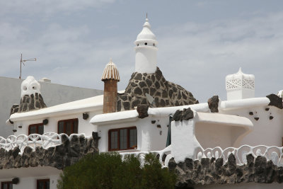 These are fully functioning houses. If you look closely you'll see a dish.