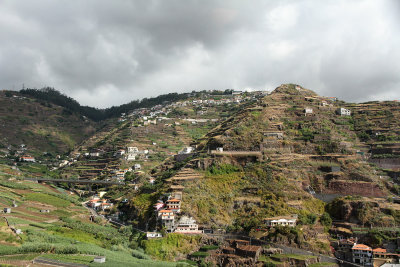 Terraces on hills going up to top of Girao