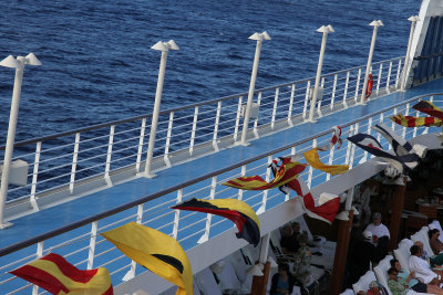 Next day, at sea. You know something special is coming when the international flags go out