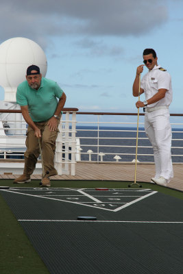Let the games begin! The officers competed against cruisers.  Howard gives shuffleboard a shot.