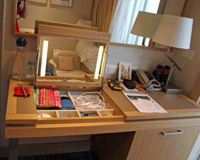 Desk, with top up. Bottom right drawer is minibar/fridge