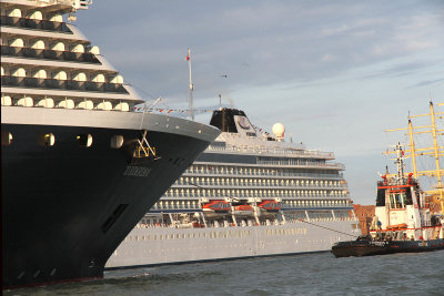 Viking Star dwarfed by Zuiderdam, had to wait for full view as vap continued around the bend
