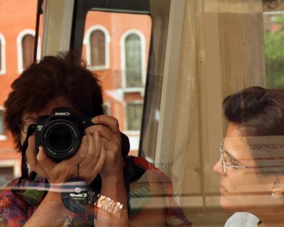 Ruth reflection in glass of vap platform from vap I was riding