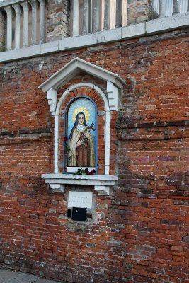 Religious decoration near P. Roma heading towards Basilio on foot Sunday afternoon