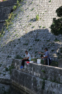 Fishing in the moat.