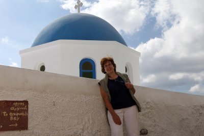Ruth at one of 2 most viewed blue domes Oia 