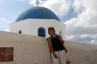 Ruth at one of 2 most viewed blue domes Oia