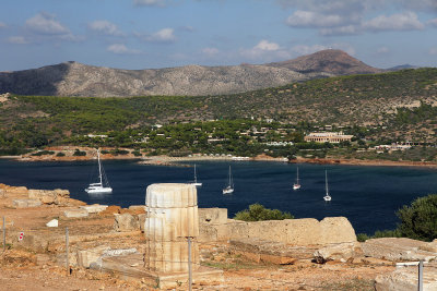 It's located on a cape (sounion, on Attica peninsula) and towers above the sea. 