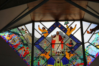 Church glass with mountain visible outside