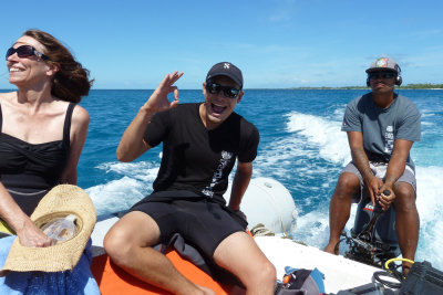 Texas cruiser, Tom and Mana on zodiac heading out or back to Six Passengers office