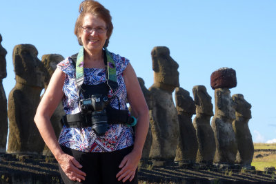 Ruth posing with moai. Almost all on island face inland.