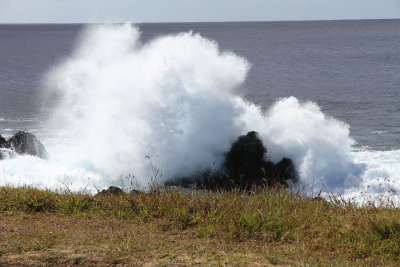 Waves crashing against rocks on walk back to Hanga Piko