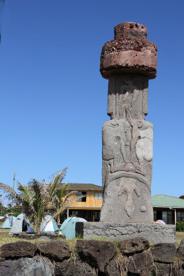 After tour stayed in town for an hour & walked along shore road. Saw moai with carvings at a campground of s