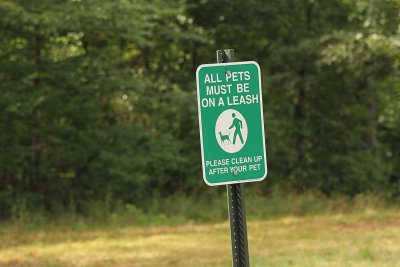 Another sign at tiny parking area. Park now & walk short way down road.