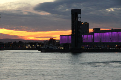 The Image Mill at the port is lit in purple; very colorful with the beautiful sunset as we left