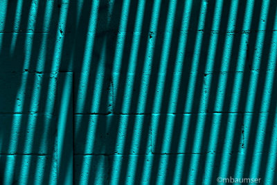 Shadows On A Blue Wall
