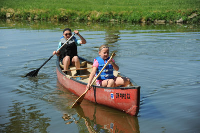 Ellie & Macey mastering the canoe