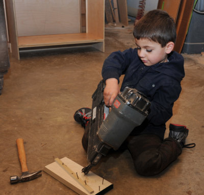 Geo helping in my shop (a staged photo for his father)