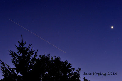 The International Space Station passing to the East, with Venus shining bright in the morning sky.
