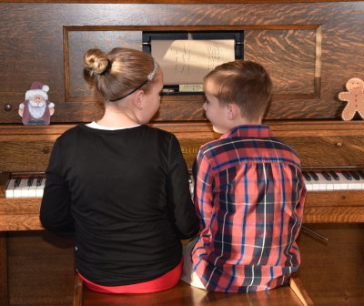 Macey and Camden at the player piano