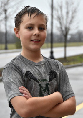 Camden after his rainy LaCross game (he's 9 years old)