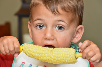 AJ is loving the fresh sweet corn