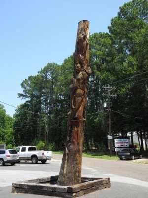 Carved totem pole.  check out all the individual carvings