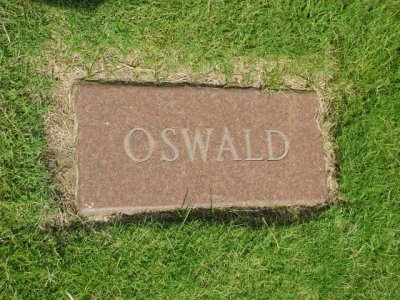 Lee Harvey Oswald.  Assassin, or patsy.  Either way, he was murdered himself.  This is the replacement stone.  T