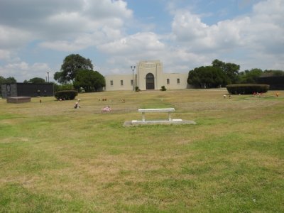 The field has two outside mausoleum's flanking the main building