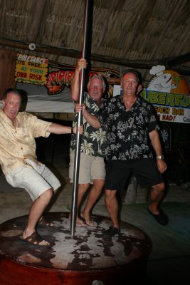Larry Keith and Michael showing off their skills at pole dancing
