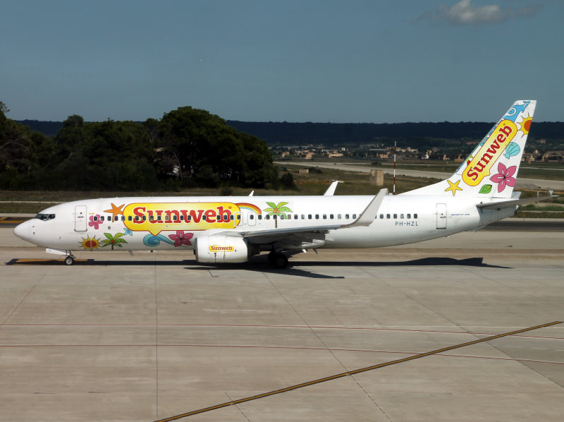 Amsterdam express at Palma in a promotional livery, taken through the (Airside' gate lounge window..