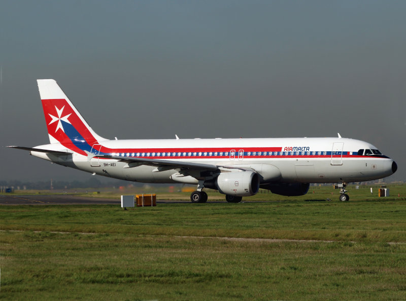 Perfect light on this Retro subject awaiting her 27L departure to Malta..