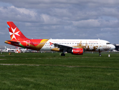 the new scheme has now been added to the Malta promotional aircraft, LHR going onto 27L for dep.