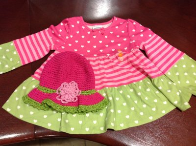 A co-worker bought this dress for her granddaughter and asked me to make a hat that would match.