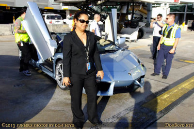 January 2013 - Karen Wright with one of the numerous Lamborghinis at MIA