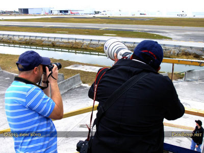 2013 MIA Airfield Tour - Kev Cook and Suresh Atapattu shooting from top of stair truck attached to American Airlines B777-223/ER