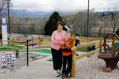April 2014 - Karen with our grandson Kyler after playing miniature golf at Adventure Golf in Colorado Springs