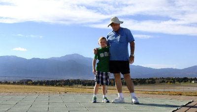 October 2014 - Kyler and grandpa Don Boyd at Peterson AFB with Pike's Peak in the background