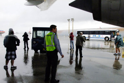 MIA Airfield Tour - photographers shooting taxiway action from underneath the left wing of AA B777-323(ER) N730AN