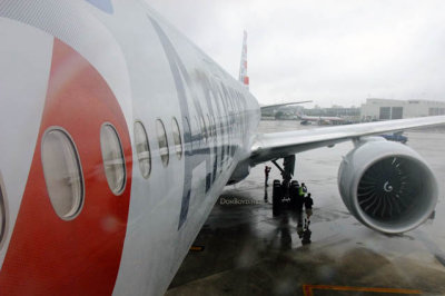 MIA Airfield Tour - view of photographers under the left wing of American Airlines B777-323(ER) N730AN at MIA